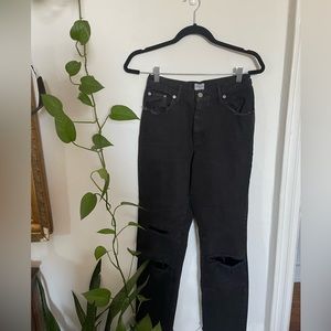 Calvin Klein black jeans. Slightly distressed.